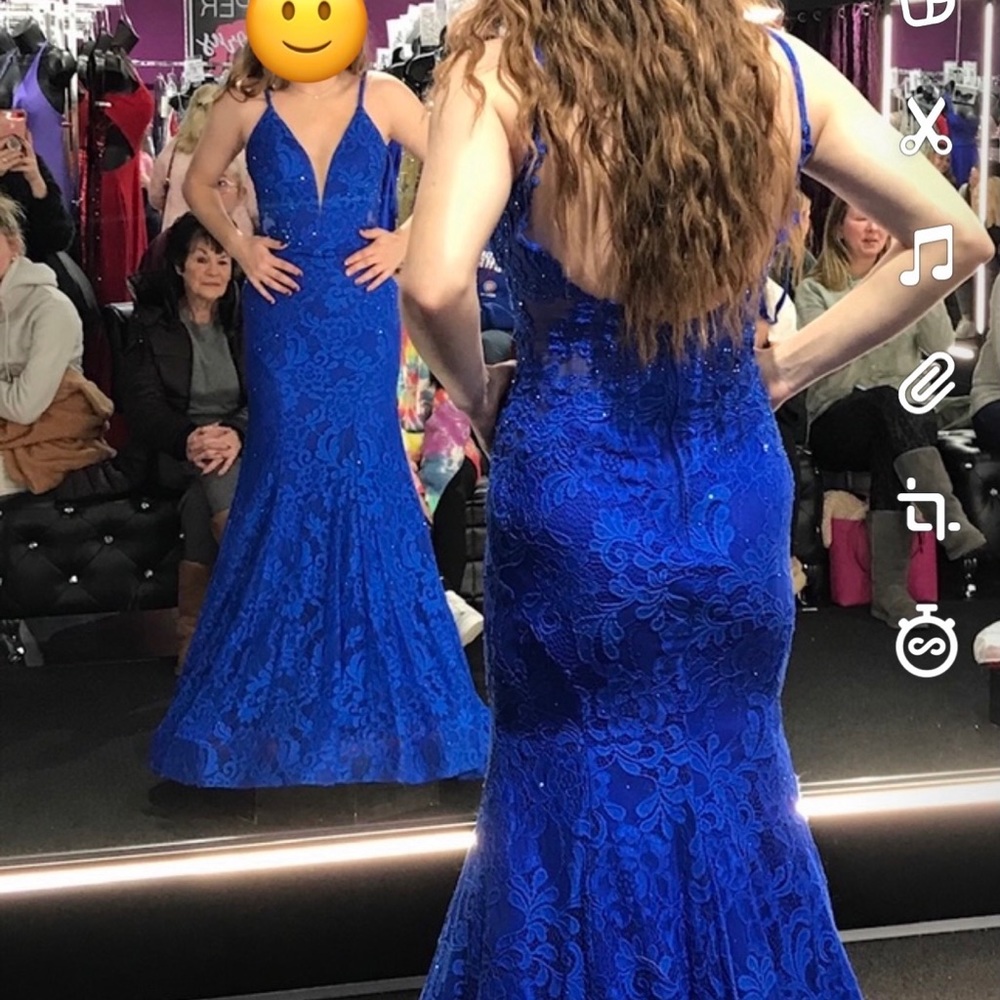 Brand new long blue dress never worn. Hemmed for a 5’3”